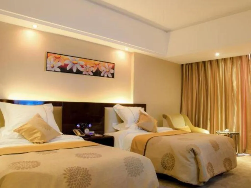 Bed in Xin Sheng Da Hong Sheng International Hotel