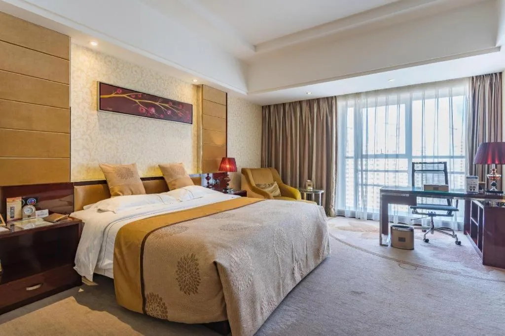 Bed in Xin Sheng Da Hong Sheng International Hotel