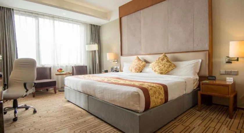Bed in Shenyang Rayfont International Hotel