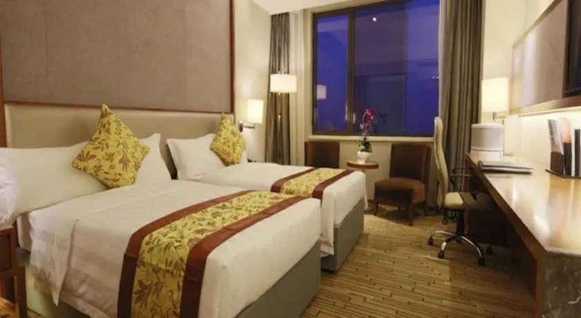 Bed in Shenyang Rayfont International Hotel