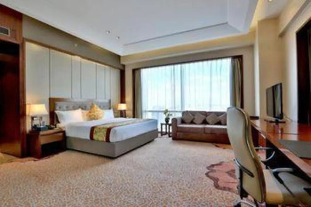 Bed in Shenyang Rayfont International Hotel