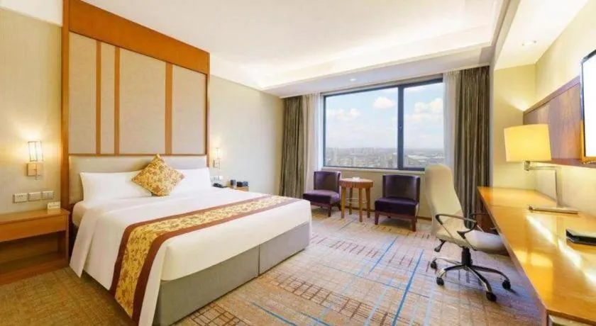 Bed in Shenyang Rayfont International Hotel