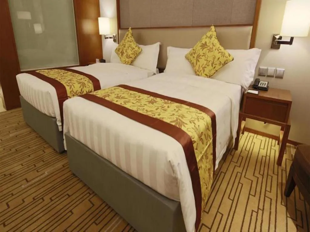 Bed in Shenyang Rayfont International Hotel