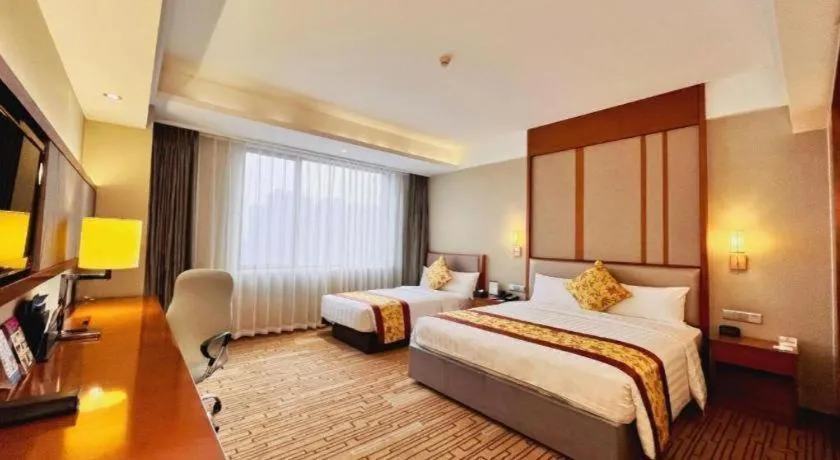 Bed in Shenyang Rayfont International Hotel
