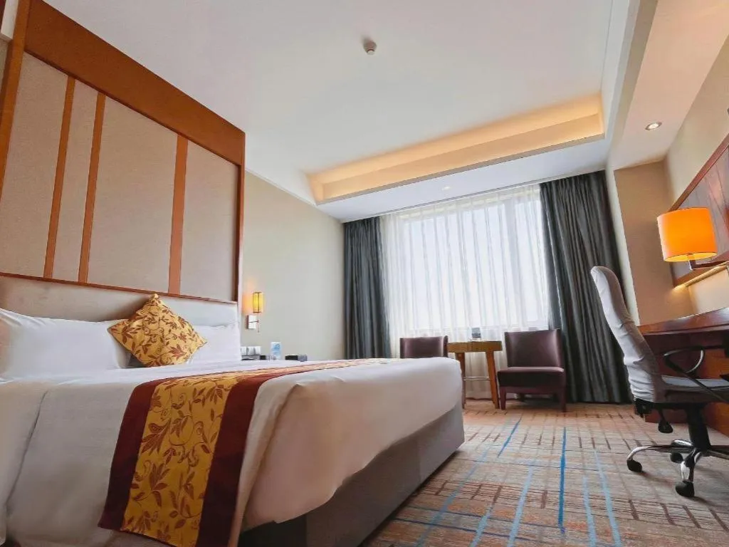 Bed in Shenyang Rayfont International Hotel