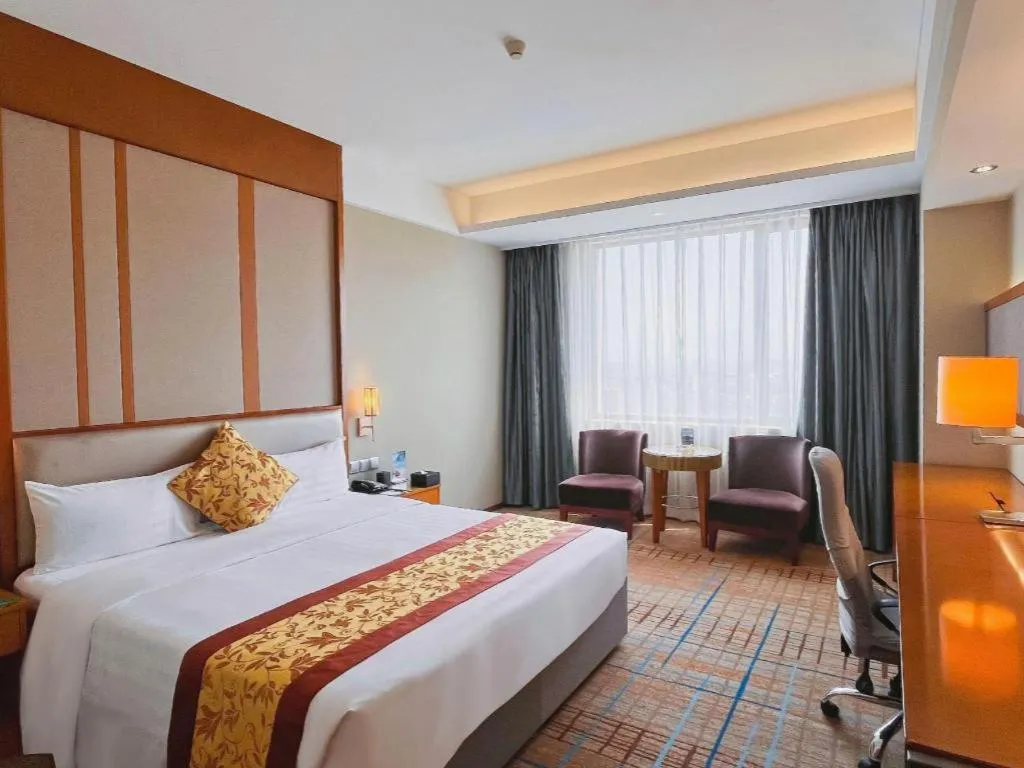 Bed in Shenyang Rayfont International Hotel