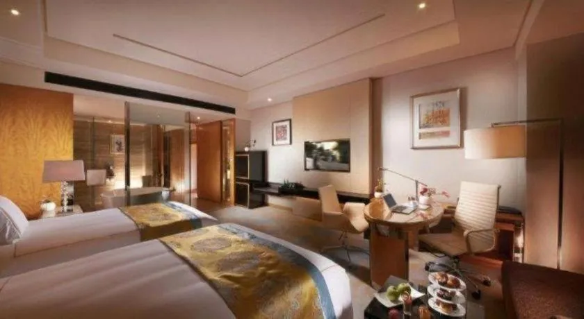 Bed in Grand Parkray Hangzhou Hotel