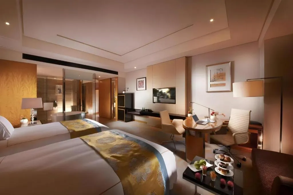 Bed in Grand Parkray Hangzhou Hotel