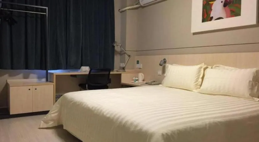 Bed in Jinjiang Inn Beijing Huairou Qingchun Road Wanda Plaza