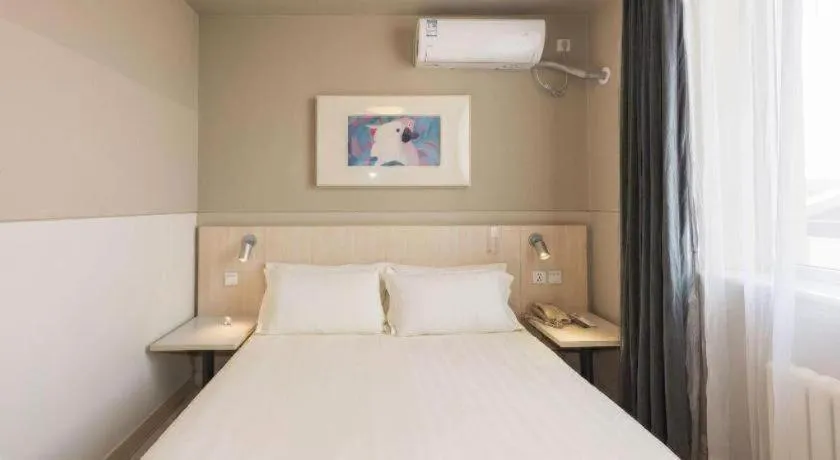 Bed in Jinjiang Inn Beijing Huairou Qingchun Road Wanda Plaza