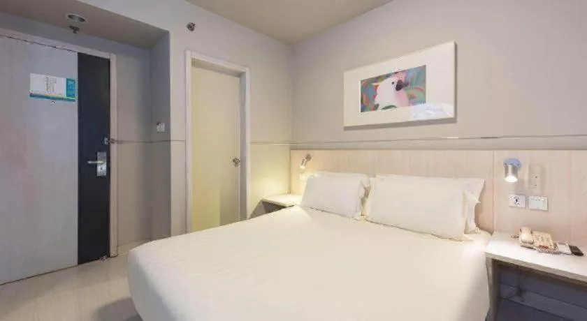 Bed in Jinjiang Inn Beijing Huairou Qingchun Road Wanda Plaza