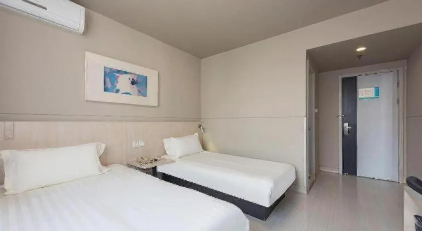 Bed in Jinjiang Inn Beijing Huairou Qingchun Road Wanda Plaza