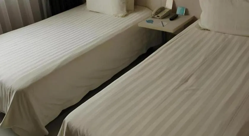 Bed in Jinjiang Inn Beijing Huairou Qingchun Road Wanda Plaza