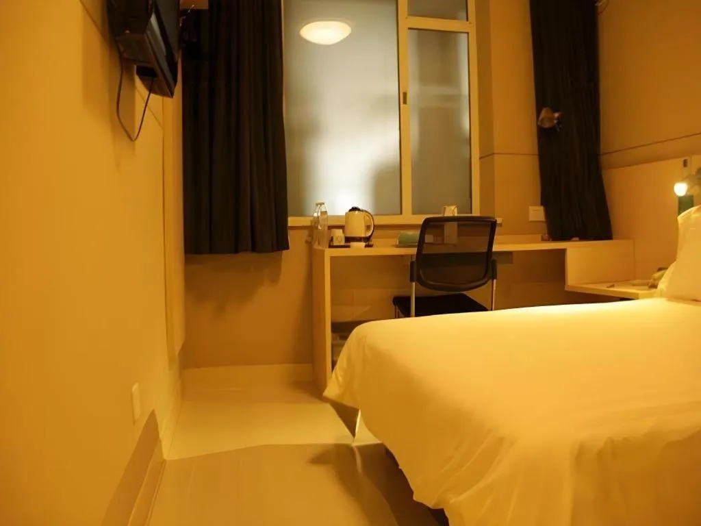 Bed in Jinjiang Inn Beijing Huairou Qingchun Road Wanda Plaza
