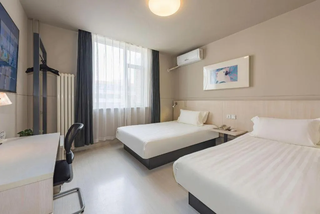 Bed in Jinjiang Inn Beijing Huairou Qingchun Road Wanda Plaza