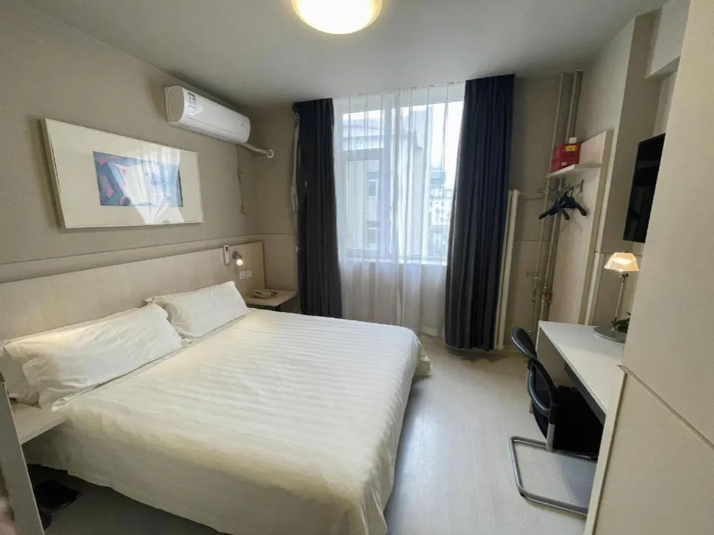 Bed in Jinjiang Inn Beijing Huairou Qingchun Road Wanda Plaza
