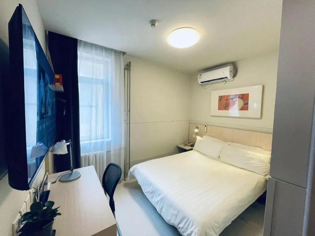 Bed in Jinjiang Inn Beijing Huairou Qingchun Road Wanda Plaza