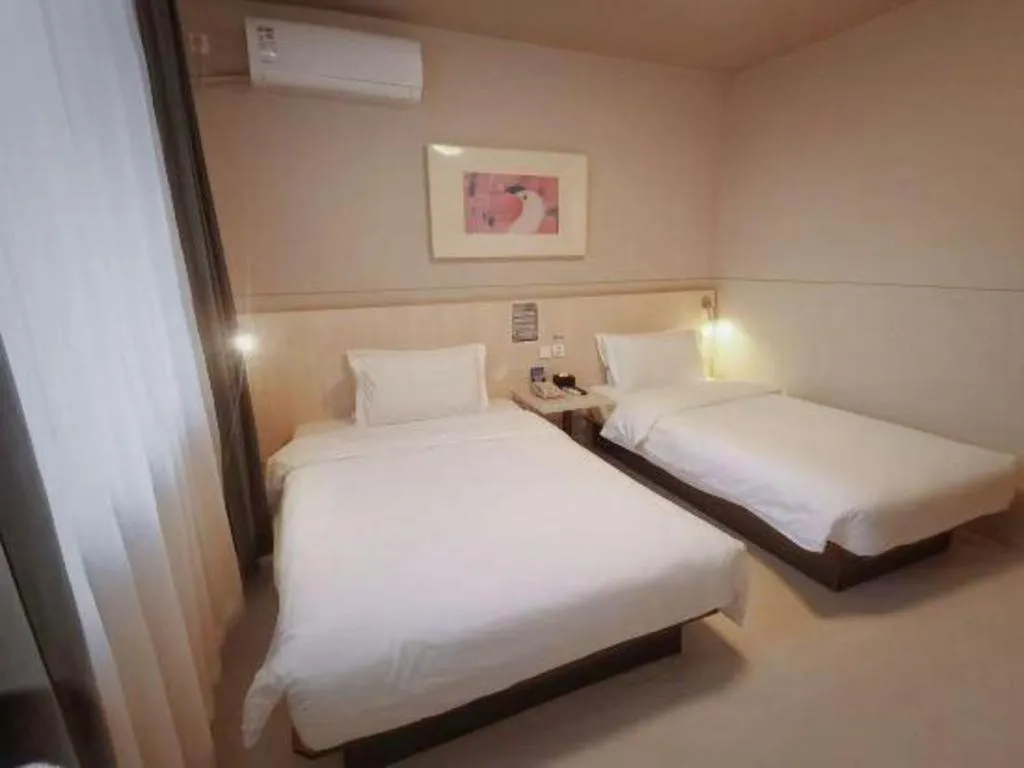 Bed in Jinjiang Inn Beijing Huairou Qingchun Road Wanda Plaza