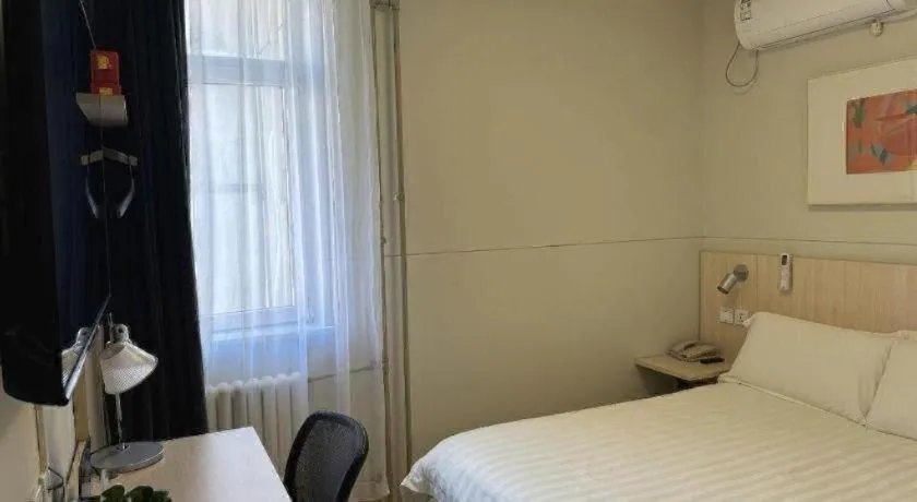 Bed in Jinjiang Inn Beijing Huairou Qingchun Road Wanda Plaza