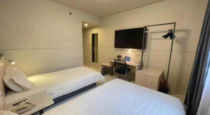 Bed in Jinjiang Inn Beijing Huairou Qingchun Road Wanda Plaza