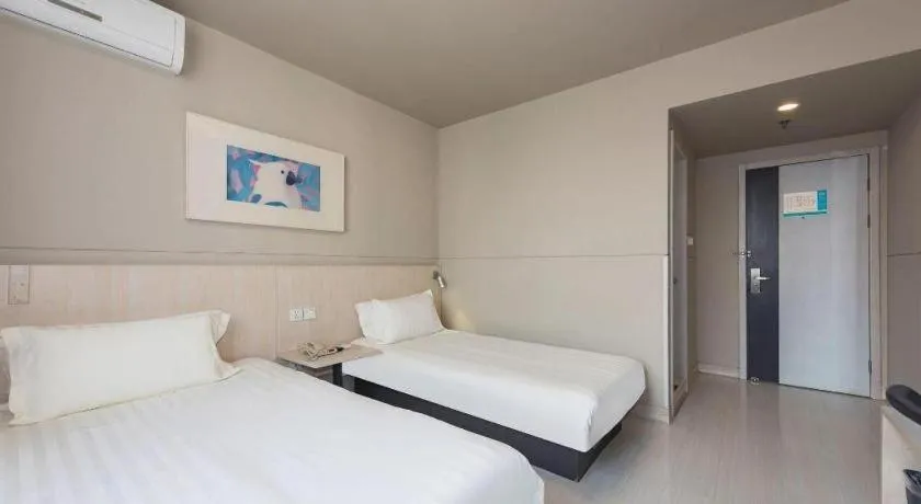 Bed in Jinjiang Inn Beijing Huairou Qingchun Road Wanda Plaza