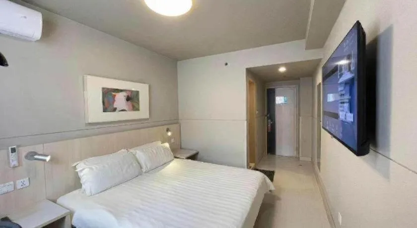 Bed in Jinjiang Inn Beijing Huairou Qingchun Road Wanda Plaza