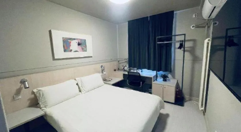 Bed in Jinjiang Inn Beijing Huairou Qingchun Road Wanda Plaza
