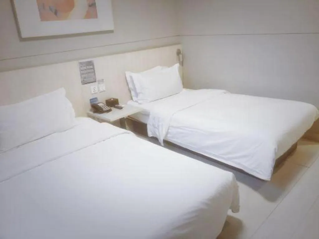 Bed in Jinjiang Inn Beijing Huairou Qingchun Road Wanda Plaza