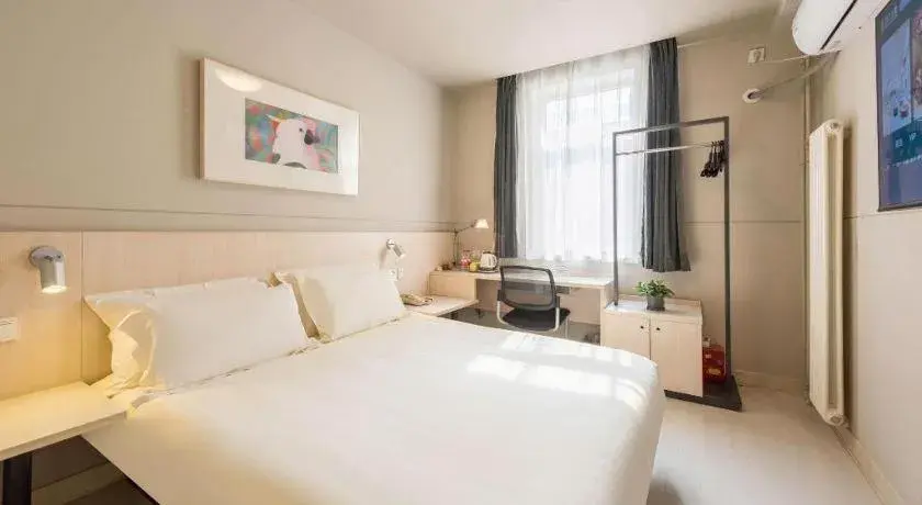 Bed in Jinjiang Inn Beijing Huairou Qingchun Road Wanda Plaza Bed in Jinjiang Inn Beijing Huairou Qingchun Road Wanda Plaza