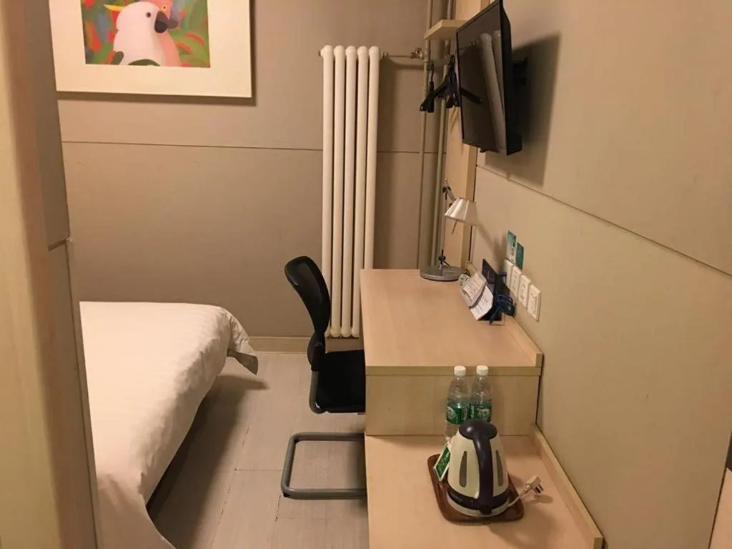 Bed in Jinjiang Inn Beijing Huairou Qingchun Road Wanda Plaza