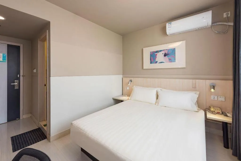Bed in Jinjiang Inn Beijing Huairou Qingchun Road Wanda Plaza