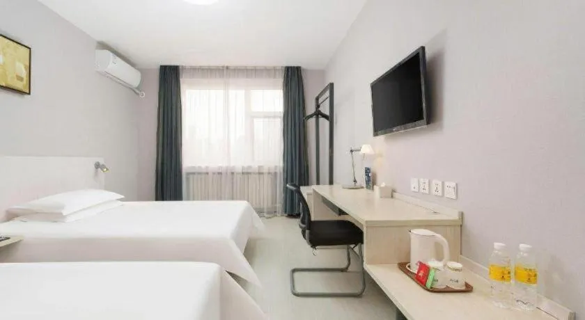 Bed in Jinjiang Inn Dalian Development Zone Jinma Road Light Railway Station