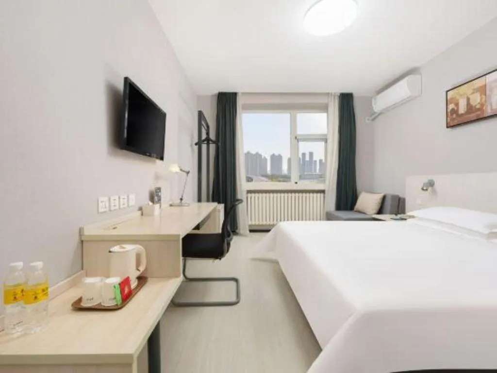 Bed in Jinjiang Inn Dalian Development Zone Jinma Road Light Railway Station