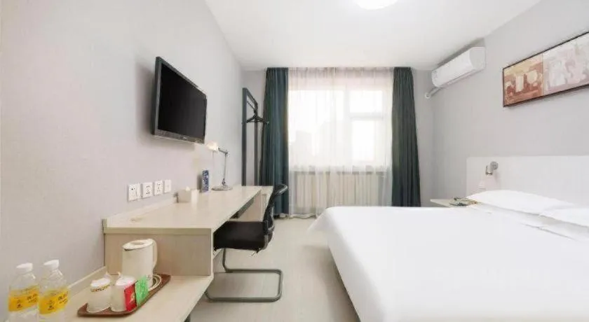 Bed in Jinjiang Inn Dalian Development Zone Jinma Road Light Railway Station