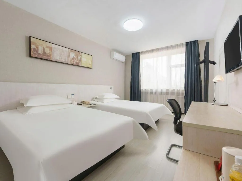 Bed in Jinjiang Inn Dalian Development Zone Jinma Road Light Railway Station