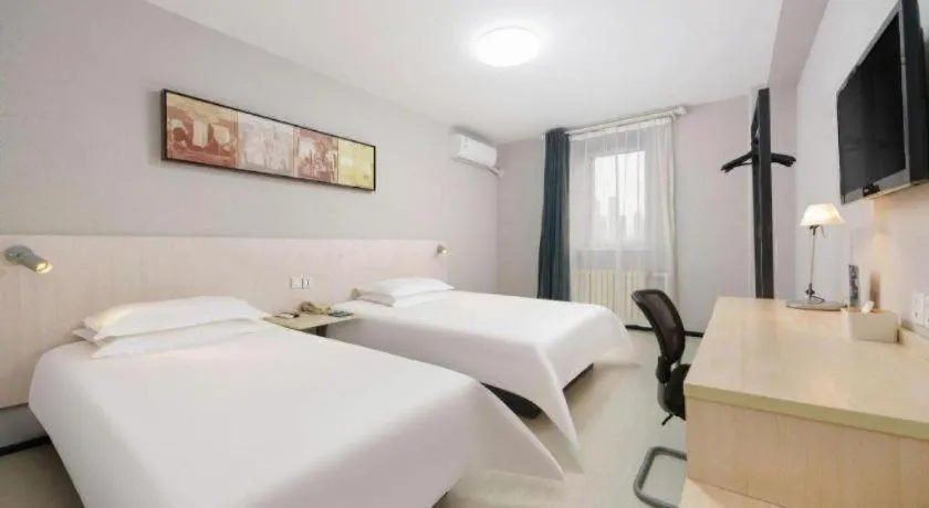 Bed in Jinjiang Inn Dalian Development Zone Jinma Road Light Railway Station