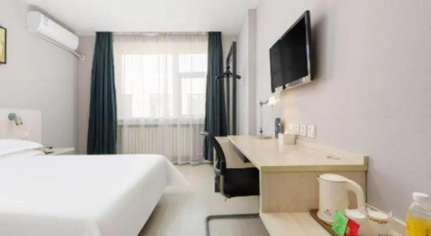 Bed in Jinjiang Inn Dalian Development Zone Jinma Road Light Railway Station