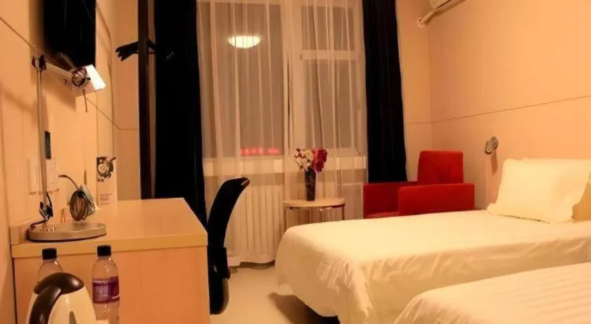 Bed in Jinjiang Inn Dalian Development Zone Jinma Road Light Railway Station