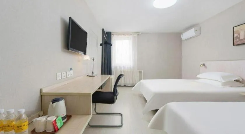 Bed in Jinjiang Inn Dalian Development Zone Jinma Road Light Railway Station