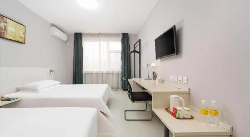 Bed in Jinjiang Inn Dalian Development Zone Jinma Road Light Railway Station
