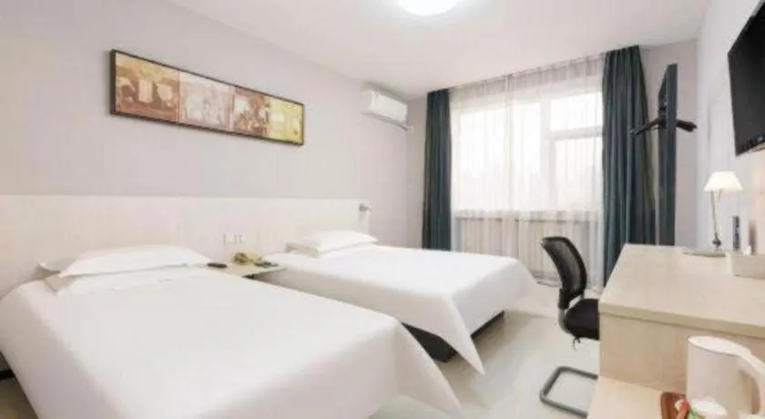 Bed in Jinjiang Inn Dalian Development Zone Jinma Road Light Railway Station