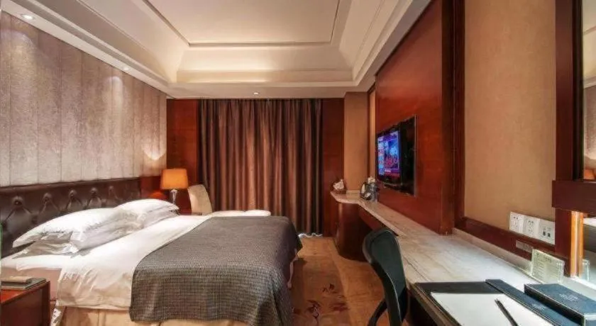 Bed in Maison New Century Hotel Wuyuan Haiyan