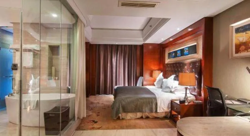 Bed in Maison New Century Hotel Wuyuan Haiyan