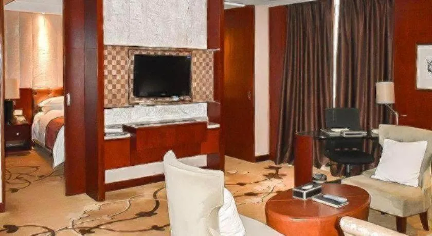 Bed in Maison New Century Hotel Wuyuan Haiyan