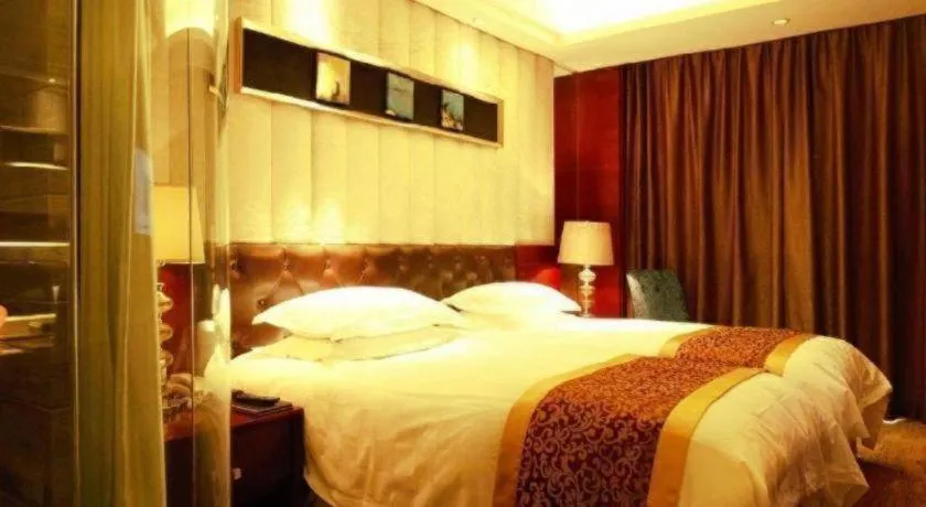 Bed in Maison New Century Hotel Wuyuan Haiyan