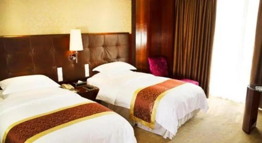 Bed in Maison New Century Hotel Wuyuan Haiyan