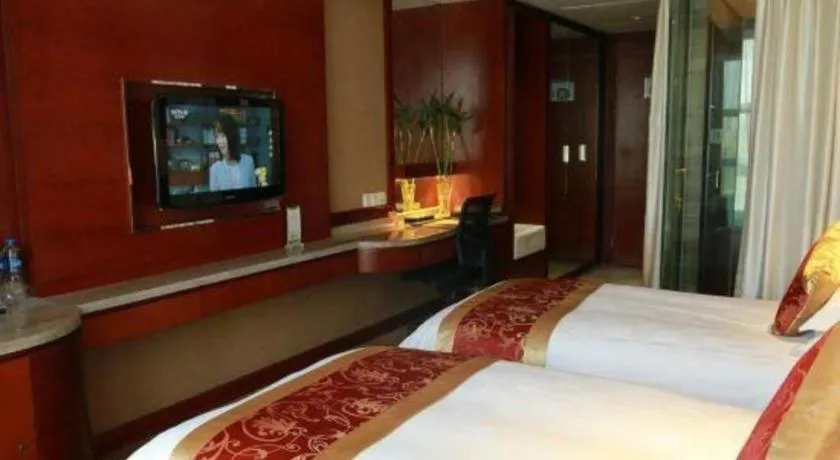 Bed in Maison New Century Hotel Wuyuan Haiyan