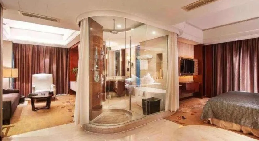 Bed in Maison New Century Hotel Wuyuan Haiyan