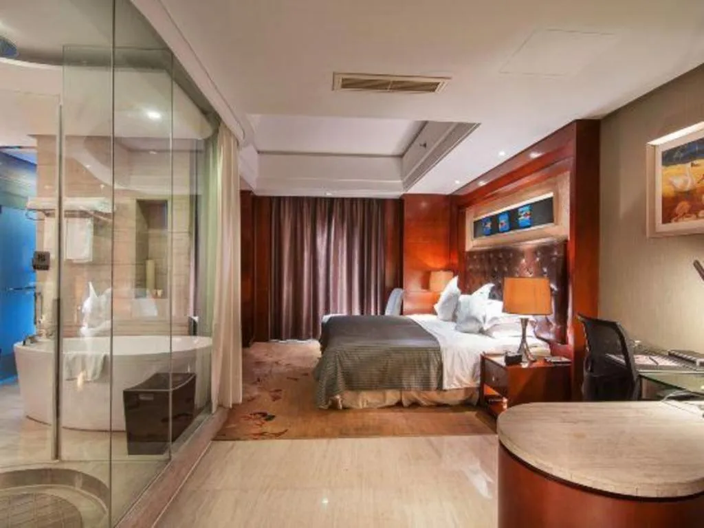 Bed in Maison New Century Hotel Wuyuan Haiyan