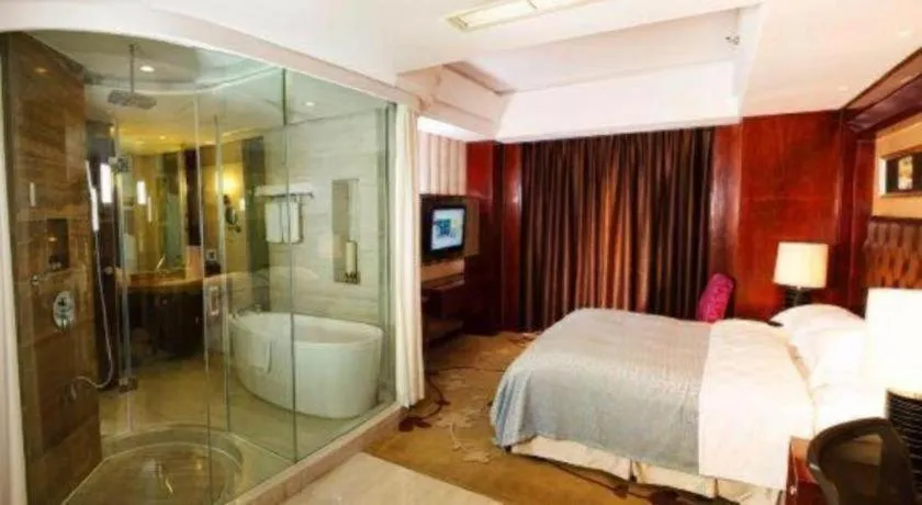 Bed in Maison New Century Hotel Wuyuan Haiyan